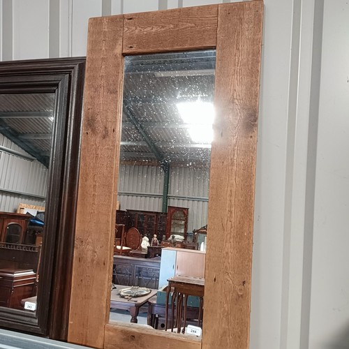 244 - A pine framed wall mirror, 105 x 55 cmPlease note collection is from TA9 4LJ only on 22nd, 23rd, 24t... 