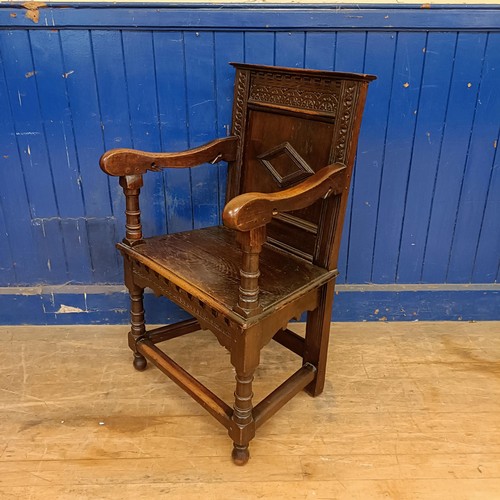 1340 - An oak Wainscot type armchair