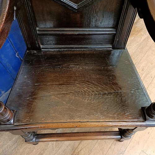 1340 - An oak Wainscot type armchair