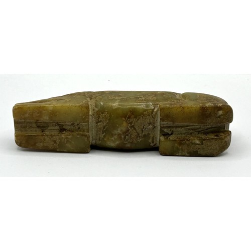 819 - A Chinese carved green stone figure of a pig, 10 cm wide