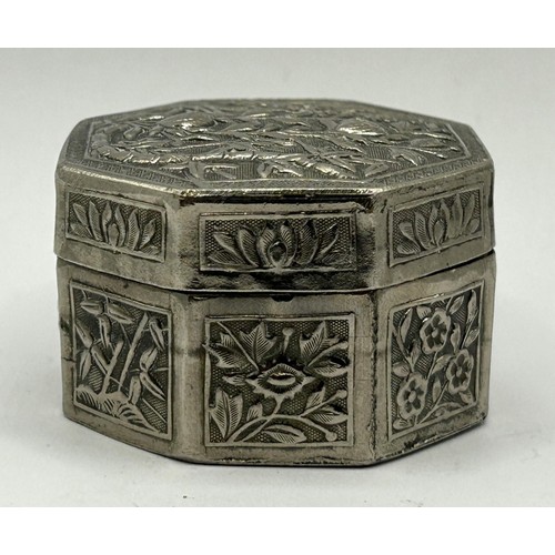 820 - A Chinese silver coloured metal octagonal box, decorated with flowers, 5 cm diameter, 39.7g