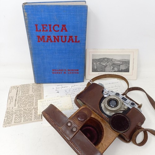 1243 - A Leica IIIb camera, circa 1937/38, serial number 242449, in a leather case, with manual and tables ... 