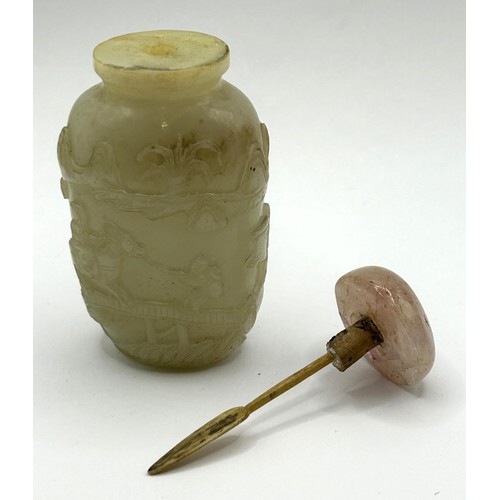 838 - A Chinese jadeite snuff bottle, 8 cm high, and a carving, 7 cm high (2)