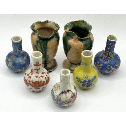 842 - A pair of Chinese miniature bottle vases, 5 cm high, three others, and a pair of vases (7)