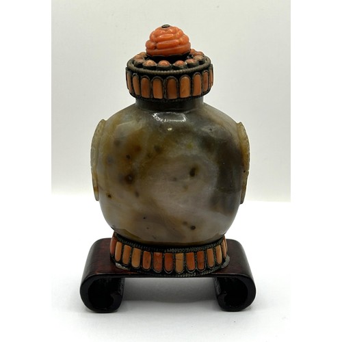 847 - A Chinese hardstone snuff bottle on stand, 10 cm high, three carved red stone figures, and assorted ... 