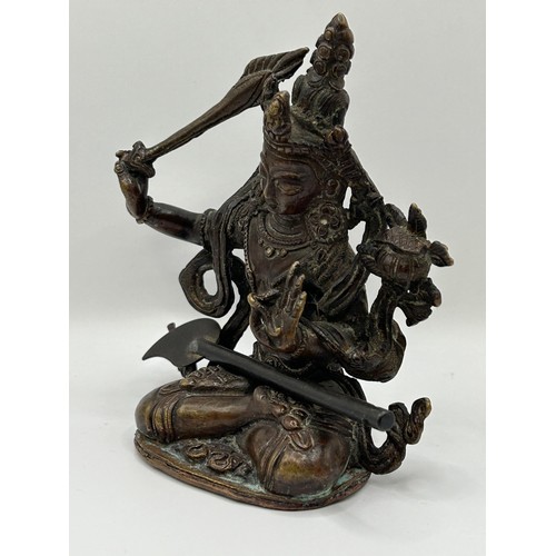 856 - A bronze Manjuinri, 14 cm high