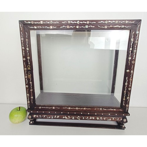 880 - A Chinese hardwood mother of pearl inlaid table top display cabinet, 47 cm wide