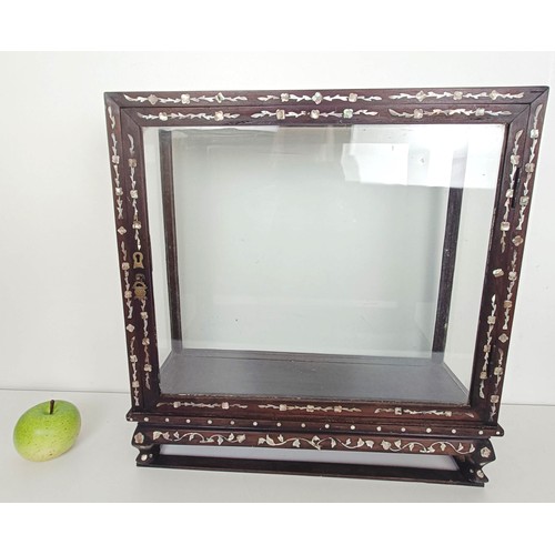 880 - A Chinese hardwood mother of pearl inlaid table top display cabinet, 47 cm wide