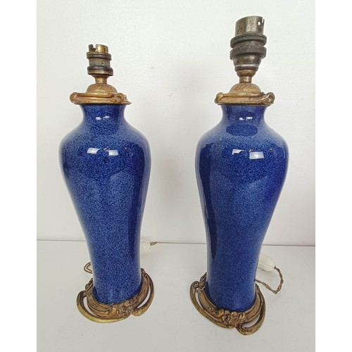 918 - A pair of Chinese powder blue vases, converted to lamps, with gilt metal mounts (2)