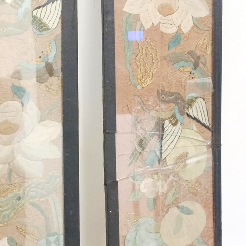 919 - A pair of Chinese embroidered sleeves, framed, 56 x 11 cm