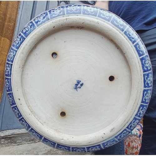 930 - A large pair of Japanese Imari planters, with various cartouches decorated figures, character mark t... 