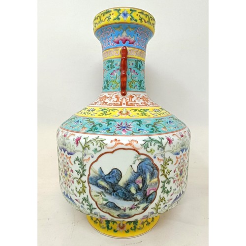 934 - A Chinese vase, decorated landscape scenes, character mark to base, 32 cm high