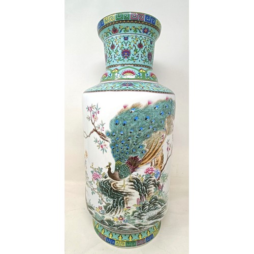 942 - A Chinese famille rose vase, of cylindrical form, decorated a peacock, character mark to base, 43 cm... 