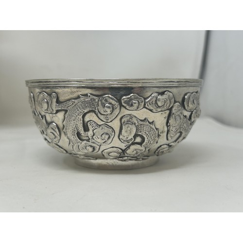 841 - A set of six Chinese silver coloured metal bowls, decorated dragons, Wang Hing, 11 cm diameter (6)