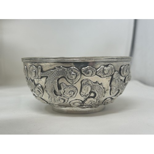 841 - A set of six Chinese silver coloured metal bowls, decorated dragons, Wang Hing, 11 cm diameter (6)