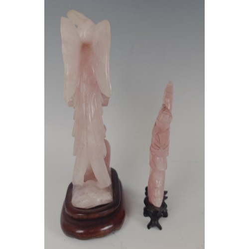 959 - A Chinese rose quartz carving of a bird, on a wooden base, 20 cm high, and another similar, 13 cm hi... 