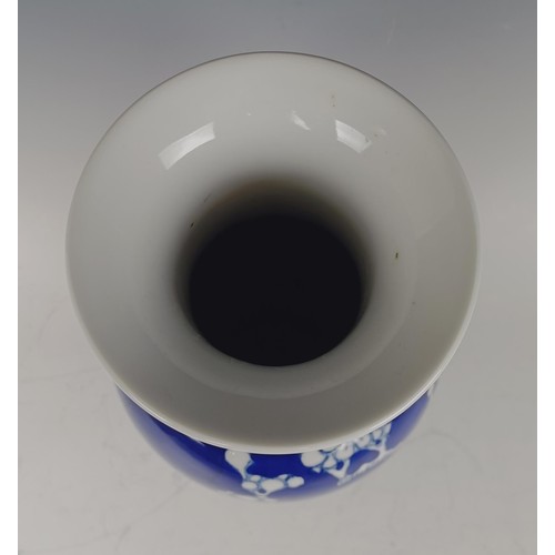 963 - A Chinese blue and white vase, decorated blossom, four character mark to base, 32 cm high