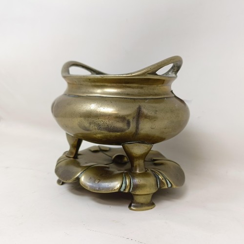 802 - A Chinese censer, 11 cm wide, and a stand