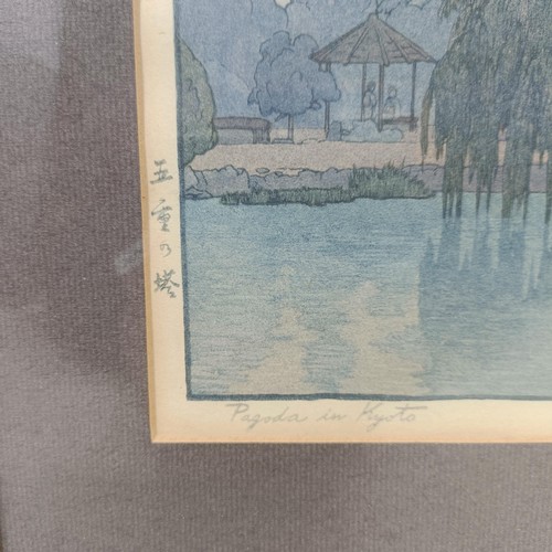 906 - A Japanese print, landscape, signed in pencil, 26 x 18 cm, and another, 18 x 26 cm (2)