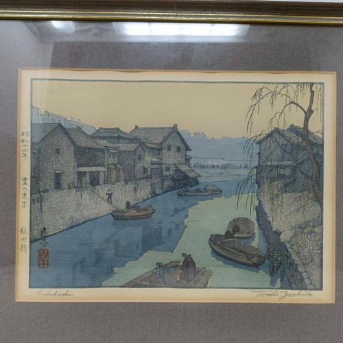 906 - A Japanese print, landscape, signed in pencil, 26 x 18 cm, and another, 18 x 26 cm (2)