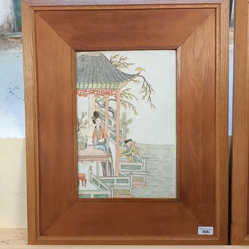 908 - A Chinese porcelain plaque, decorated figures, 36 x 25 cm, and its pair, in a modern frame (2)