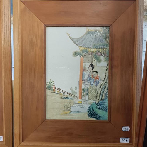 908 - A Chinese porcelain plaque, decorated figures, 36 x 25 cm, and its pair, in a modern frame (2)