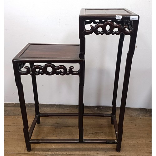 883 - A Chinese two tier hardwood stand,  70 cm wide