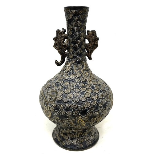 971 - A Chinese pottery vase, decorated a dragon, highlighted in gilt, character mark to base, 23 cm high