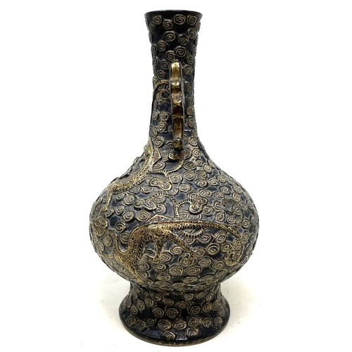 971 - A Chinese pottery vase, decorated a dragon, highlighted in gilt, character mark to base, 23 cm high