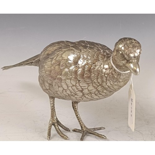 8 - A large Continental silver coloured metal cock pheasant, .835, 23 cm high, and a hen, 39.2 ozt (2)...