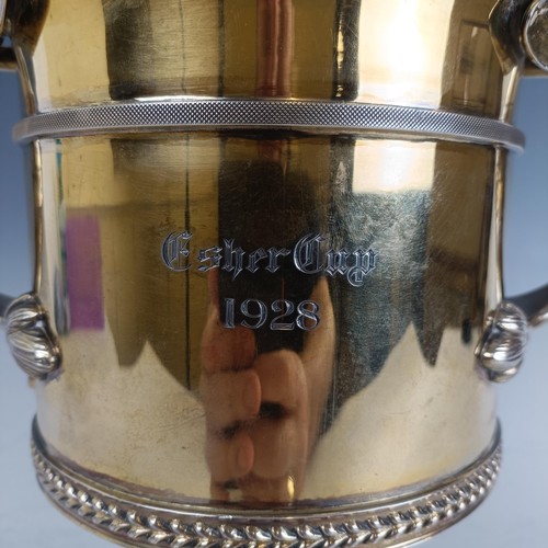 11 - A good George V silver gilt trophy cup and cover, engraved 'Esher Cup 1928, Won by Seagray', the cov...