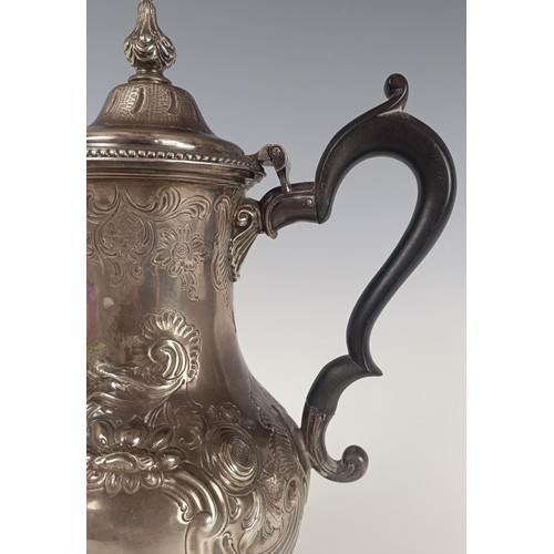 20 - A George III silver coffee pot, with embossed decoration, London 1775, 30.5 ozt (all in), 30 cm high...