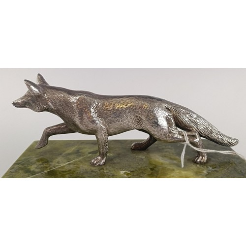 45 - A silver coloured metal model of a fox, on a marble base, with a silver plaque engraved 'Nick and Xa...