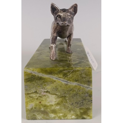 45 - A silver coloured metal model of a fox, on a marble base, with a silver plaque engraved 'Nick and Xa...