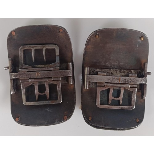 53 - A pair of silver coloured metal and leather shoe buckles, and another pair similar, both cased (2)