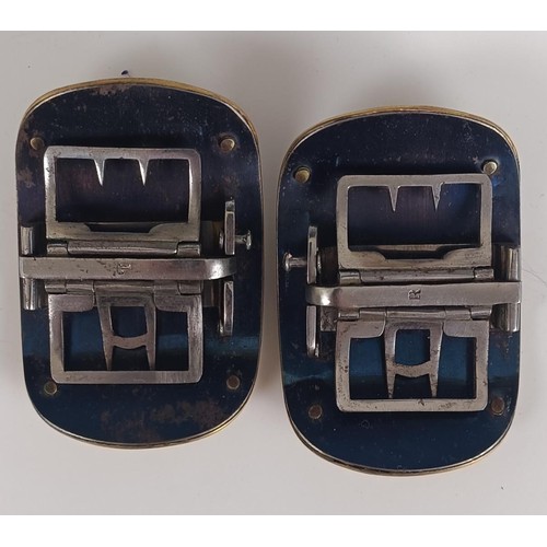 53 - A pair of silver coloured metal and leather shoe buckles, and another pair similar, both cased (2)