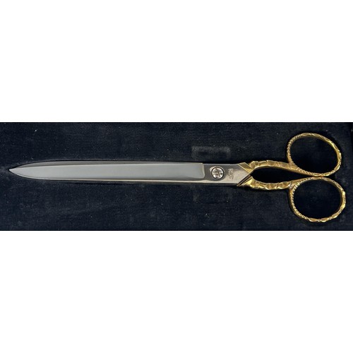 62 - A pair of gilt metal ceremonial scissors, cased