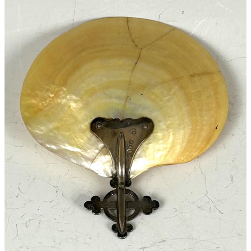 71 - A 19th century, baptismal spoon, a shell, with silver mount, in the form of a cross, cased