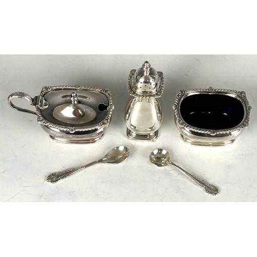 85 - A silver three piece cruet set, in a fitted box, Birmingham 1962, and a silver butter knife, silver ... 