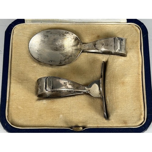 100 - A 19th century silver cream jug, marks rubbed, and a baby's push and spoon, cased, 8.2 ozt (2)