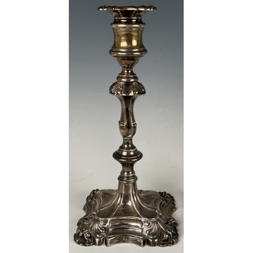 102 - A pair of William IV  cast silver candlesticks, Sheffield 1837, 15.2 ozt, 24 cm high