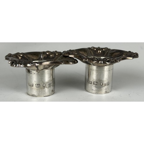 102 - A pair of William IV  cast silver candlesticks, Sheffield 1837, 15.2 ozt, 24 cm high