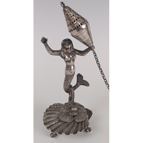 111 - An 18th century style plated spice box, being held aloft by a mermaid on a dolphin with a shell base... 