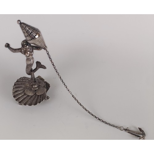 111 - An 18th century style plated spice box, being held aloft by a mermaid on a dolphin with a shell base... 