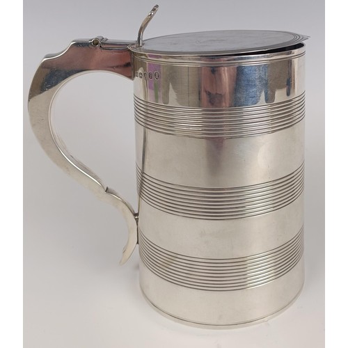 120 - A late 18th century silver lidded tankard, initialed, inside inscribed '...Henry Delany Died...1790'... 