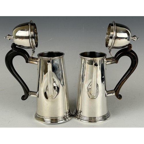 123 - A pair of George V silver chocolate pots, with wooden handles, London 1913, 21 ozt (all in) (2)
