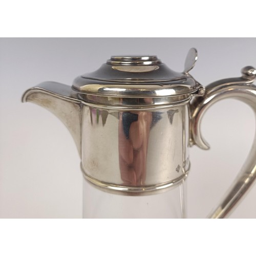 127 - A late Victorian silver and glass claret jug, London 1894, 20 cm high