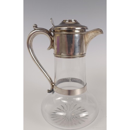 127 - A late Victorian silver and glass claret jug, London 1894, 20 cm high