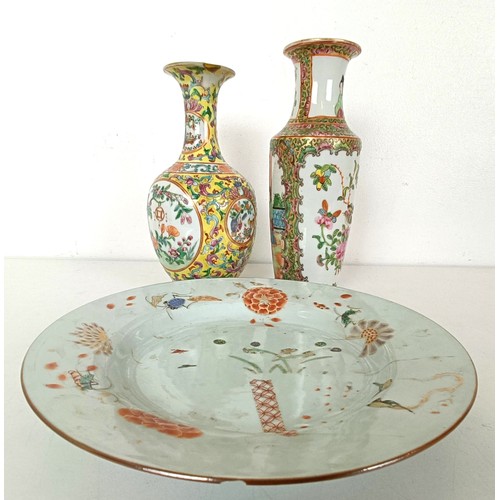 953 - A Chinese vase, decorated flowers, 20 cm high, another vase, and a plate (3)