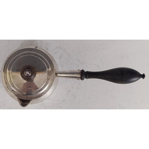 144 - A George III silver brandy pan and lid, with a wooden handle, London 1775, 14.2 ozt all in, 25 cm wi... 